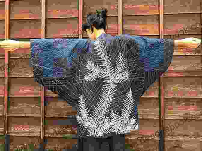 A Woman Wearing A Sashiko Kimono With Intricate Geometric Patterns The Of Japanese Art Sashiko: Sashiko Sewing Projects For The Modern Home With Detail Tutorial