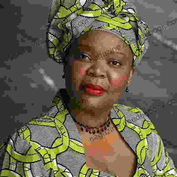 Leymah Gbowee, A Woman With Short, Curly Hair, Wearing A Traditional African Dress And Smiling. Liberation Is Here: Women Uncovering Hope In A Broken World